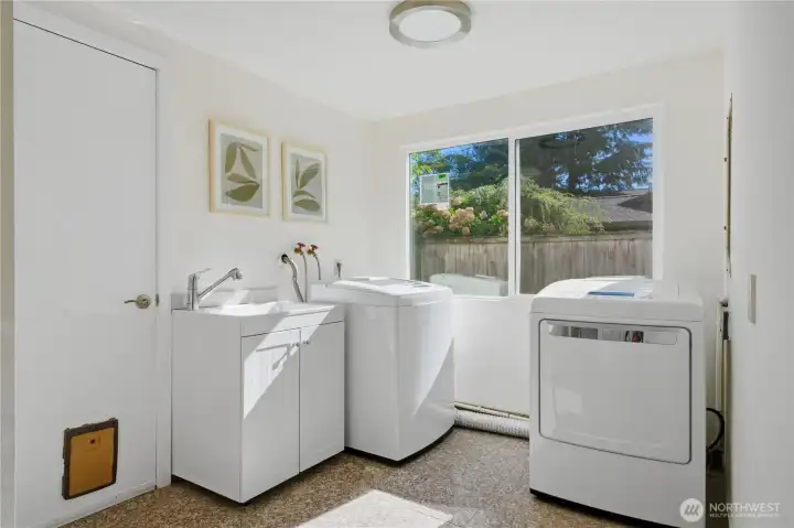 Laundry room with extra storage space (not in picture)