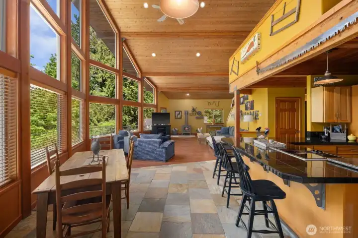 Kitchen with breakfast bar and river views