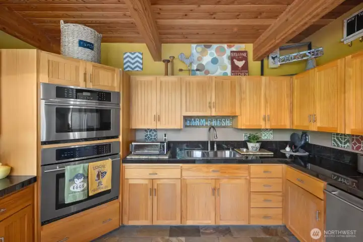 Open layout kitchen with ample cabinetry, great for entertaining