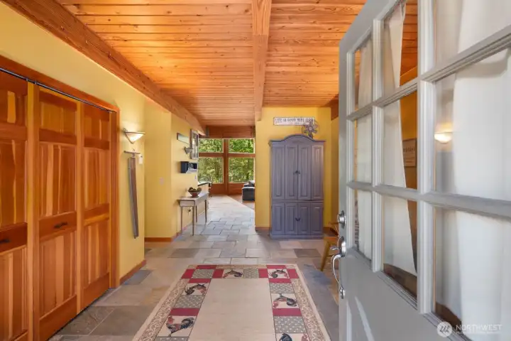 Spacious grand entryway with room for a sofa, chairs, etc