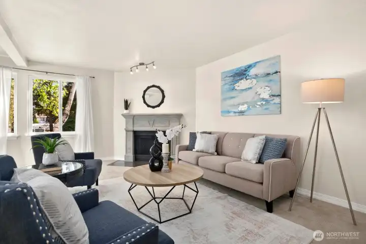 Open concept family room transitions into kitchen