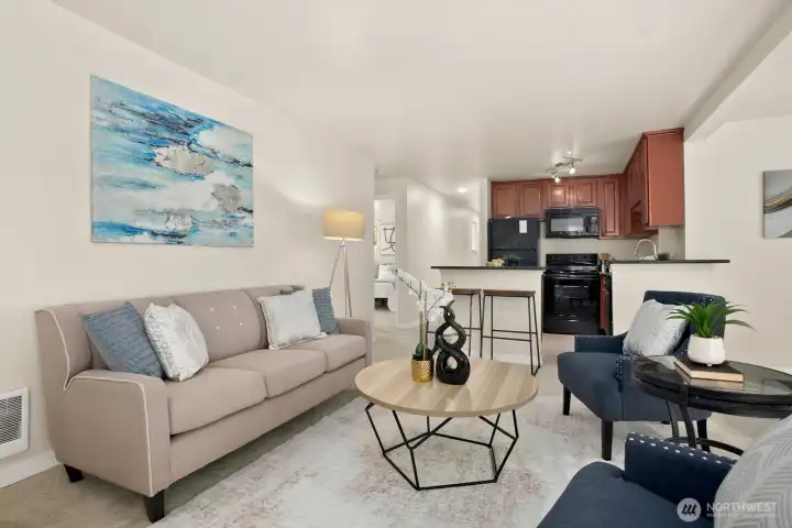 Open concept family room transitions into kitchen