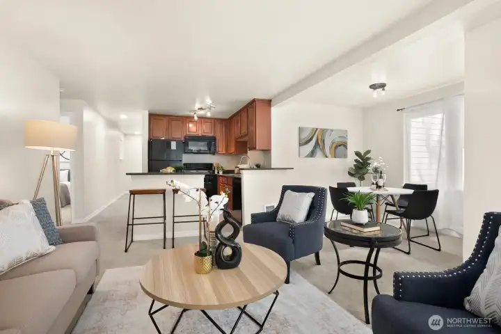 Open concept family room transitions into kitchen
