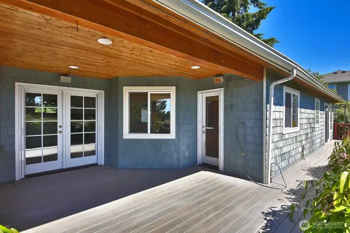The smaller door goes directly into the kitchen area.