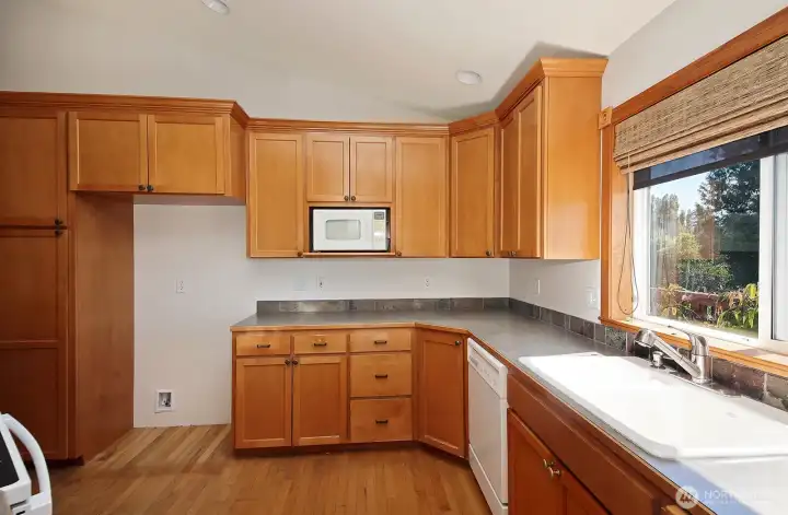 Classic crown moulding trim finishes the cabinet tops.