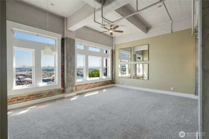 Walls of windows flood the space with gorgeous eastern light Walls of windows flood the space with gorgeous eastern light