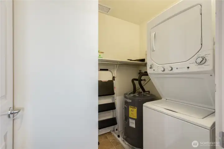 In-unit laundry room with additional storage In-unit laundry room with additional storage