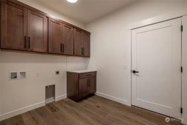 Laundry Room | Spacious with great storage!