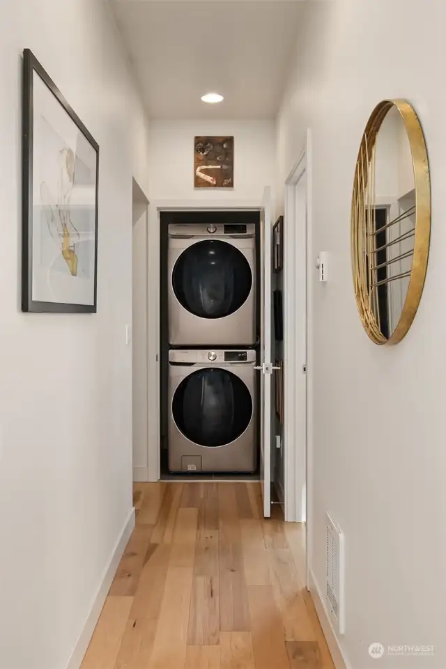 Stacked full size Samsung washer dryers purchased in April 2021.