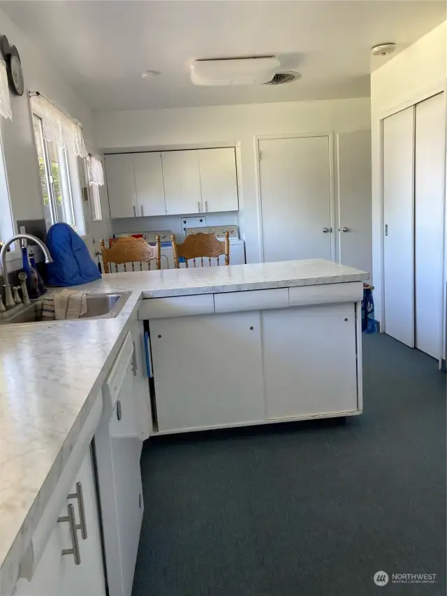 Kitchen/Dining and laundry area