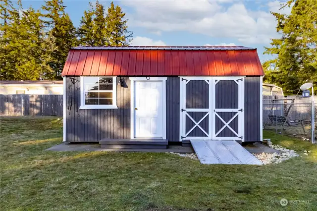 The largest of the 3 sheds -matches the house!