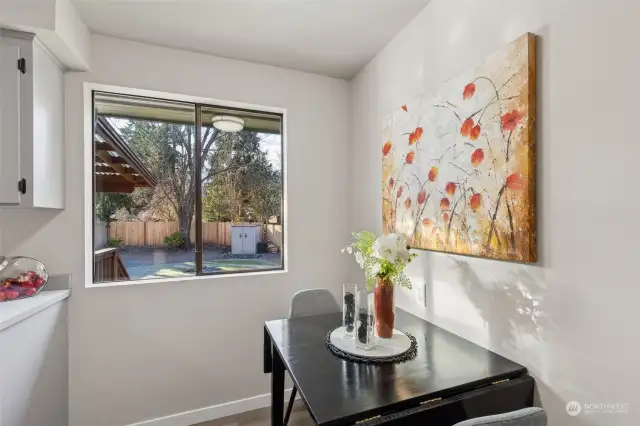 Kitchen Eating Area with view of the large backyard