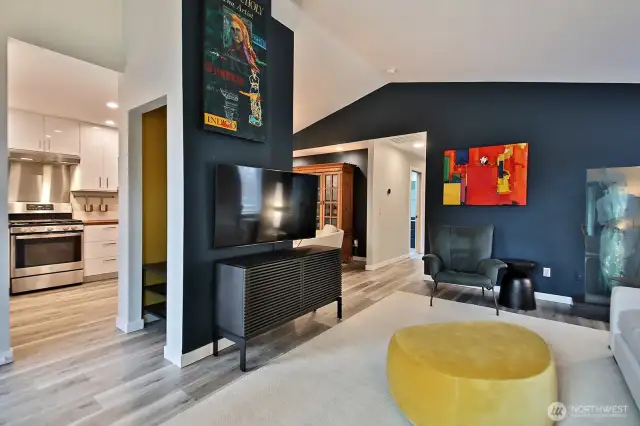 And one more perspective from your living room. More of the kitchen to your left, open coat closet is directly across from the front door. Let's go check out your new kitchen!