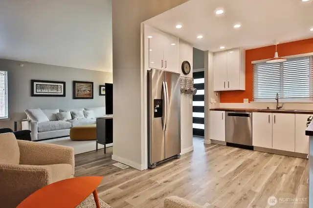 Refrigerator has been recessed and all cabinetry is new. Please take the time to open up the cabinets when you tour and check out the impeccable design and efficiency of these cabinets.