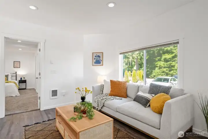 The home is privately situated and the large windows allow so much natural sunlight  into the home!