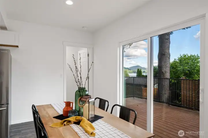 Looking from the dining room over the new Trex deck with Lake Samish beyond.