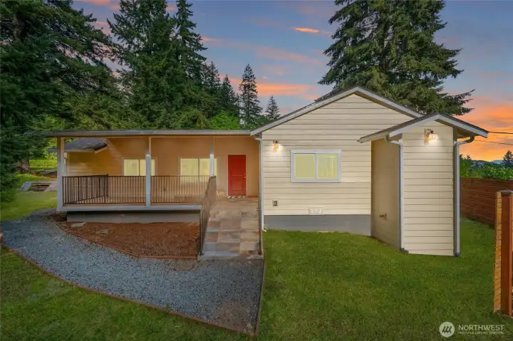 Welcome to this privately situated home with main floor living overlooking Lake Samish.