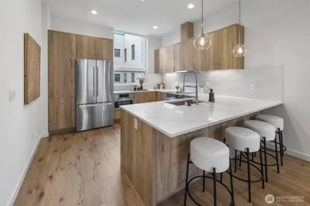 Photos are of model home 379. Layout and finishes and view may vary.
