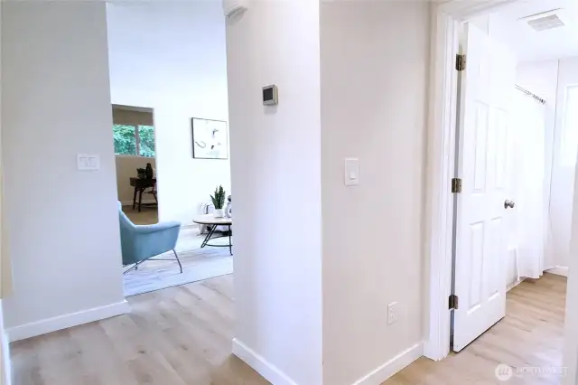Hallway view of Living & Main Bath