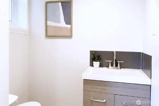 Half Bath with upgraded vanity, sink, faucet & storage shelving