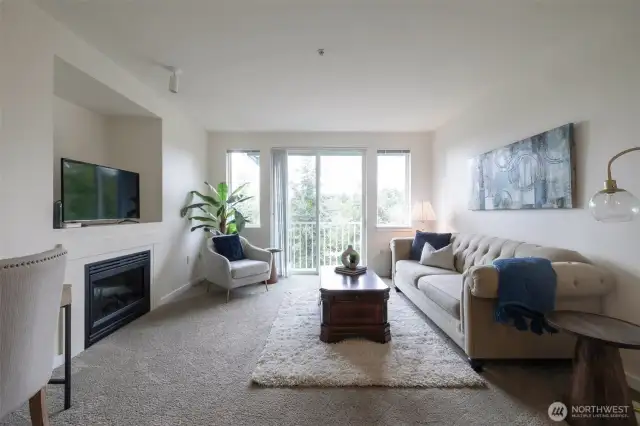 Top floor  living room & primary suite city, pond views