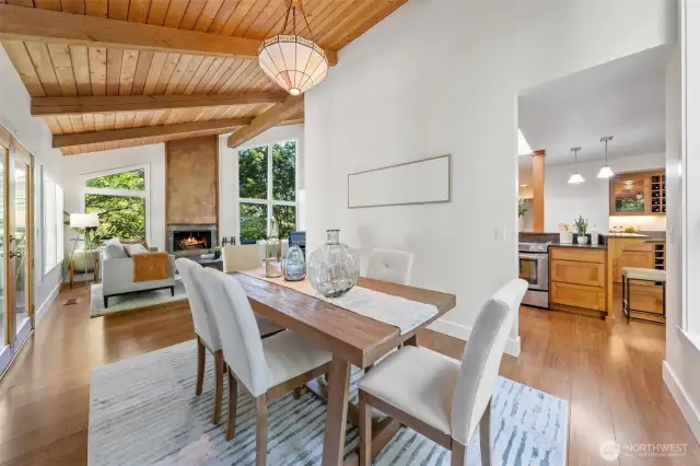 Gather in style—this inviting dining area flows effortlessly between the kitchen and living room.
