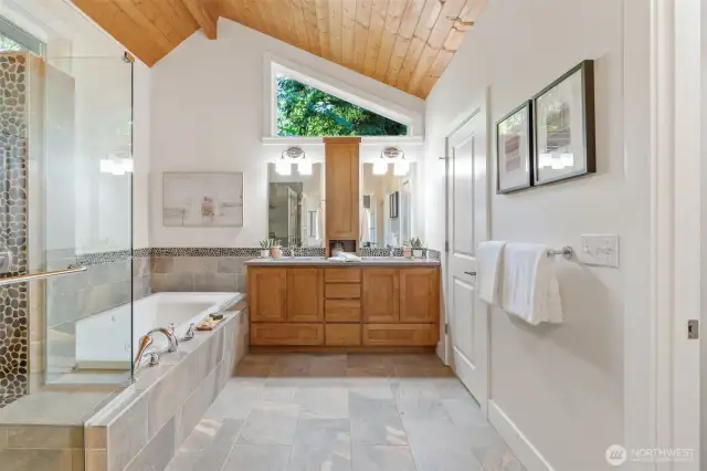 Welcome to your spa-inspired 5-Piece Primary Suite bathroom. Every detail has been thoughtfully considered—from the rich wood cabinetry and natural stone finishes. A true retreat designed to elevate your everyday.