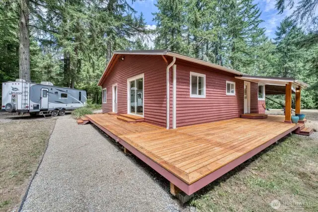 The big deck with covered entry. There is another great RV parking spot on the left.