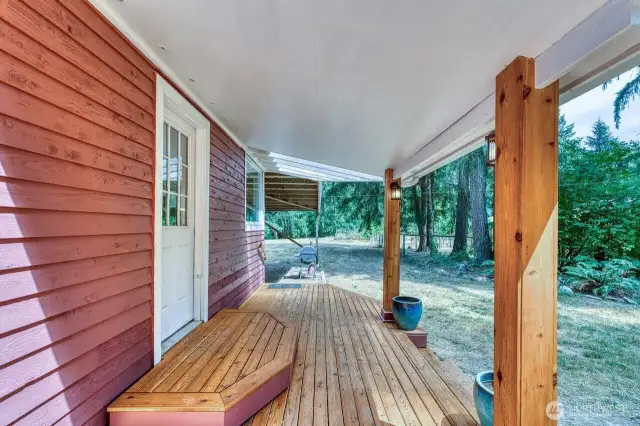 The big deck looking out the barn and chicken coop.