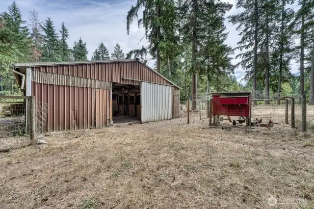 Let's have a look at the nice six stall barn.. chicken coup on the left.