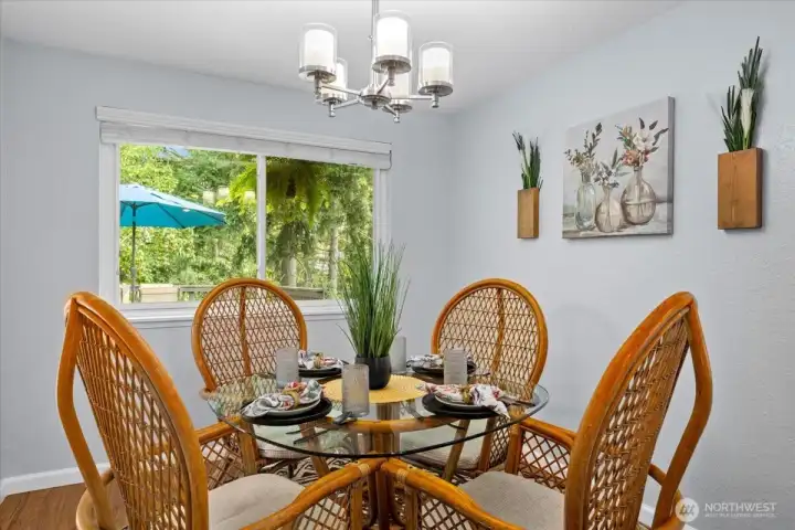 Dining area off the kitchen and living room for added convenience.