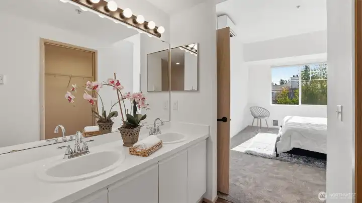 Relax and unwind in the large soaking tub featured in the primary bath.