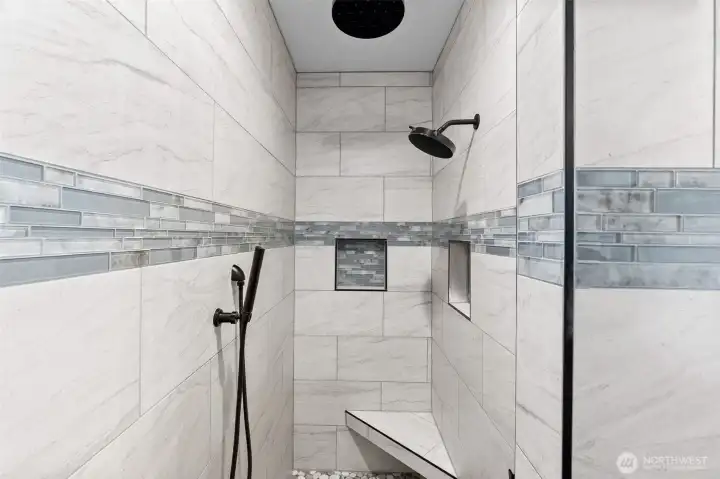 Primary bathroom.  Note 6 way shower diverters.