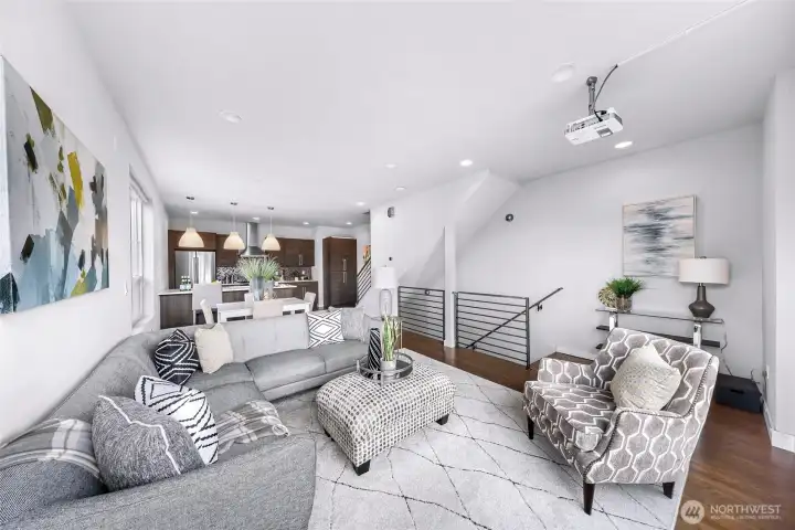 Family room leading into dining are and gourmet kitchen.