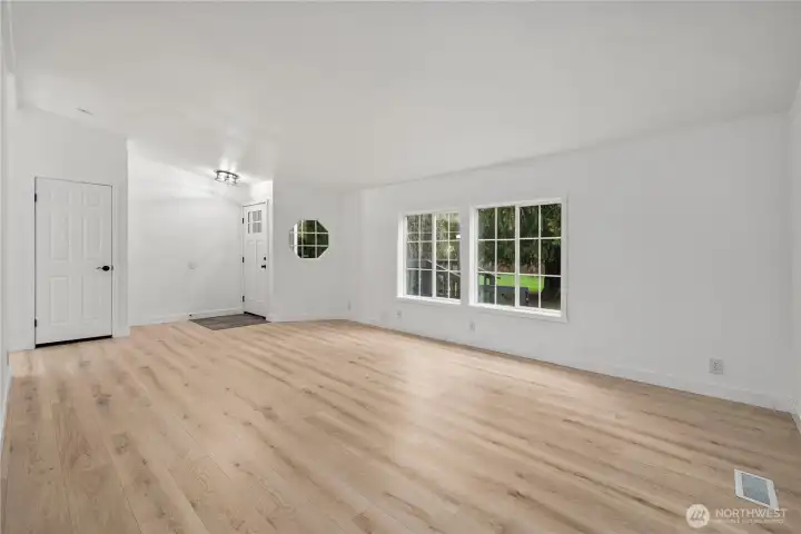 Living Room with closet door to left and entry in middle