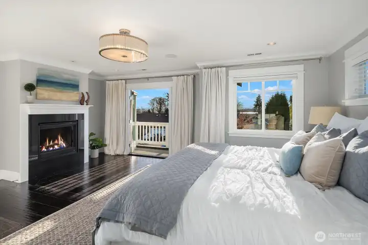 Spacious primary suite with views of the lake, city and mountains.