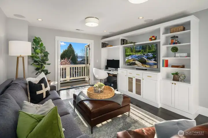 One of the 4 bedrooms upstairs, currently set up as a bonus room/office