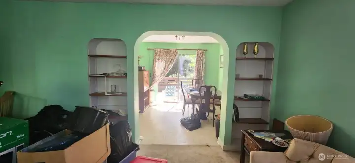 Enter into first living space with dining room and deck access directly to the rear. Kitchen lies to the left of dining room and ties directly to second living space.