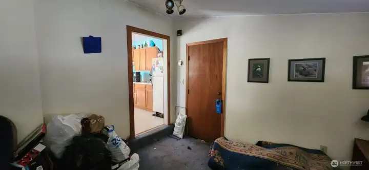 Kitchen door on left, garage door on right.