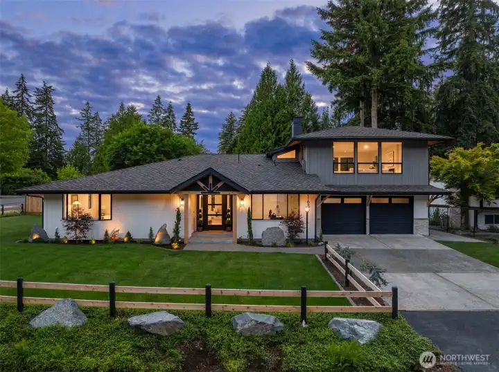 Welcome to this fully renovated 3000 sq ft corner lot home that lives like a rambler.