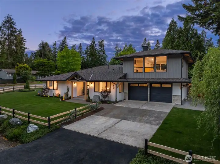 Renovations on both interior and exterior of home.  New sod, new fence, decorative boulders and beautiful uplighting.