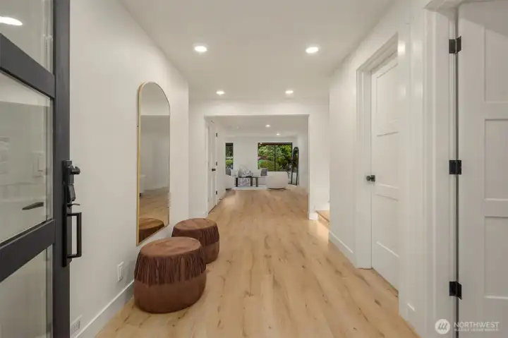 The grand entrance provides wide hallway and exhibits the stunning new flooring found throughout.