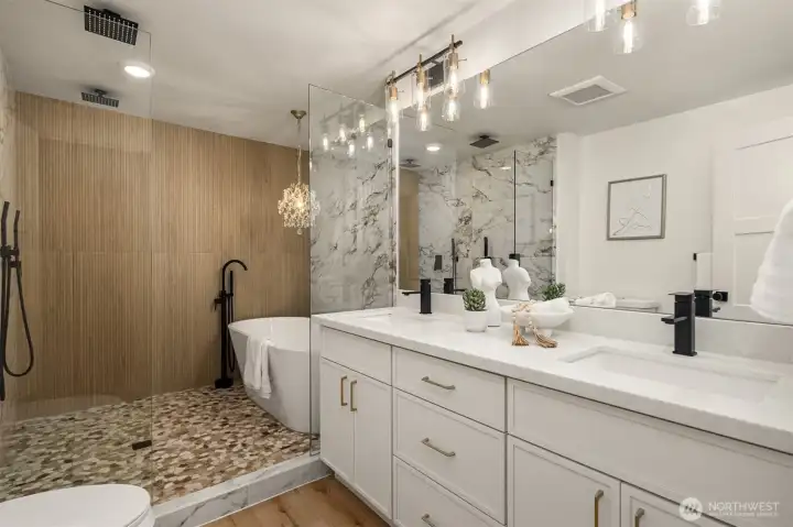 Spa-inspired Primary Bathroom offers dual vanity, soaking tub and 2 rainfall showerheads!