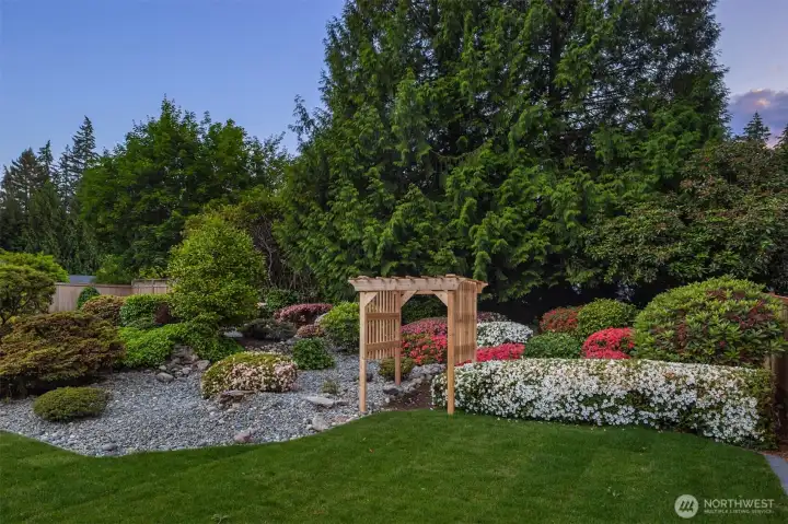 Take a walk through the new garden arch on the pathway through the flowers.
