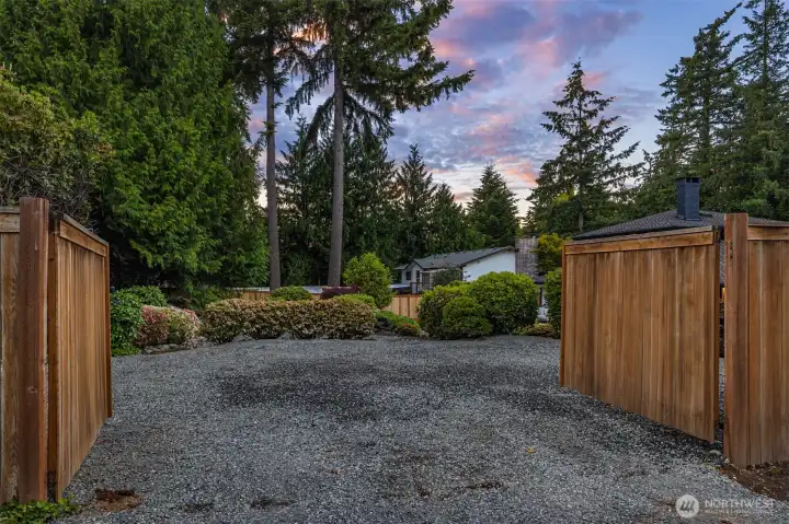 Gate added to side yard for easy access to RV Parking pad from side street