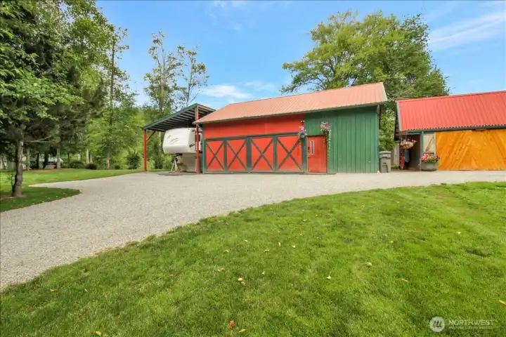 Covered RV parking, huge 2 bay show with workspace and second level