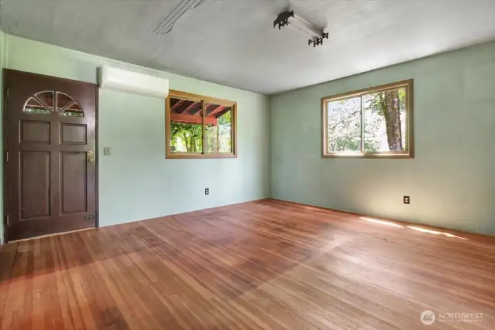 Living room and front entry door