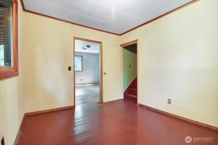 Room grants access to upstairs primary and office