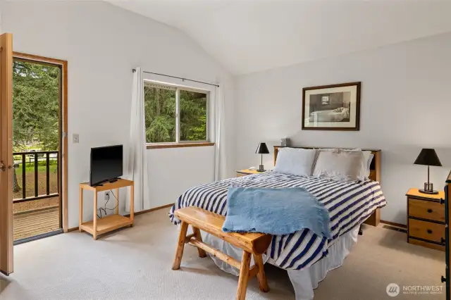 Another upstairs bedroom w/ balcony & ensuite bathroom