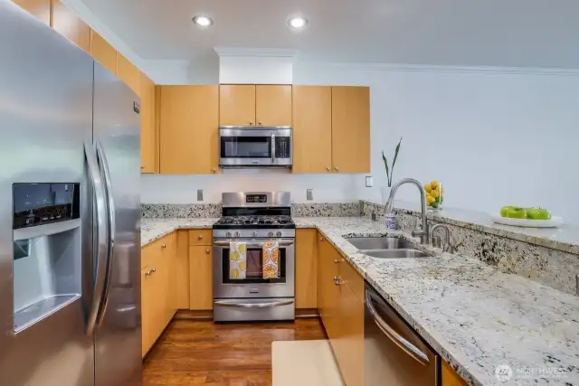 Updated with granite and sleek stainless steel appliances!